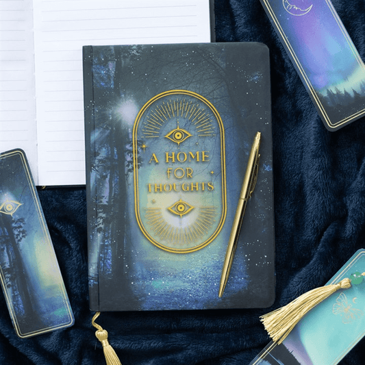 Notebook with 'A Home for Thoughts' text on a dark blue background with a pen next to it.