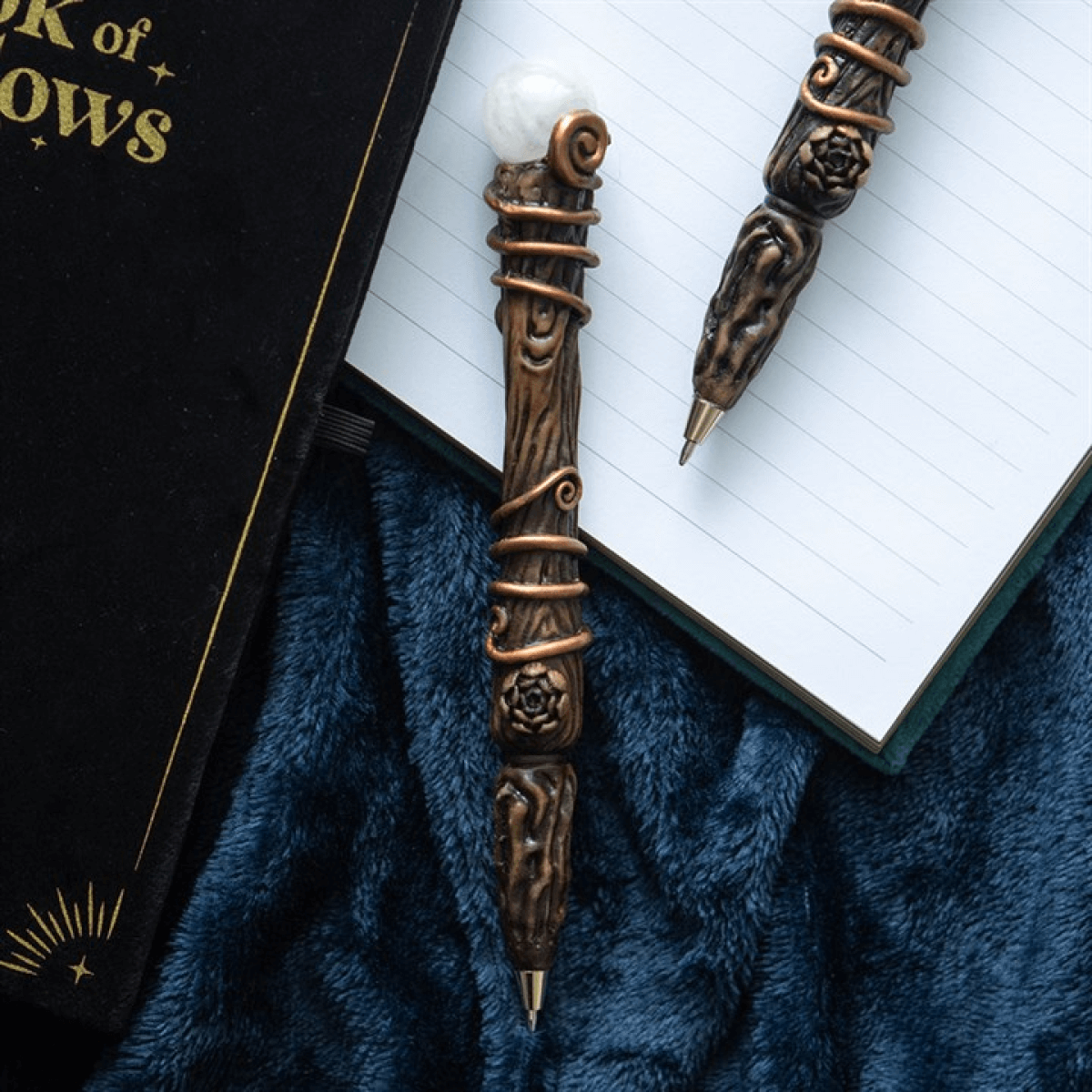 Decorative pen with intricate design on a book