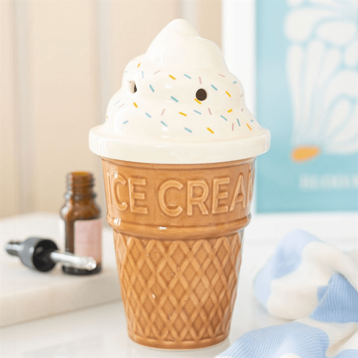 Ice cream cone-shaped container with a lid on a surface.